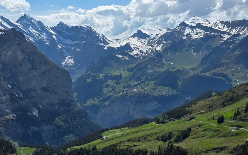 Kleine Scheidegg offers sweeping alpine views of snow-covered mountains.
