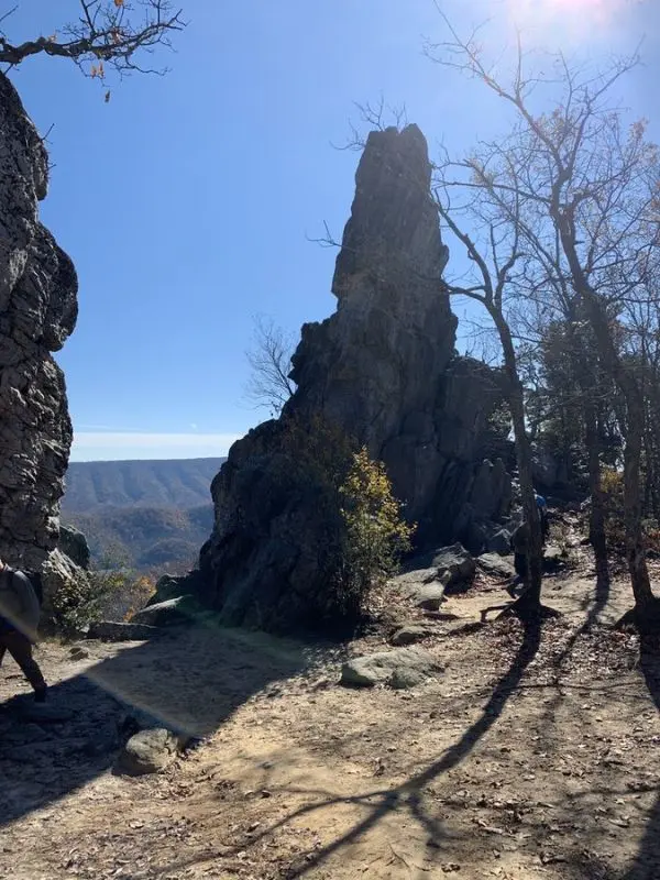 Rocky spire formation along a hiking trail at Dragon’s Tooth.