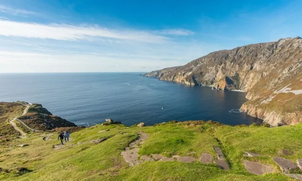 Sliabh Liag offers sweeping cliffside views over the ocean with walking paths along the green hills.