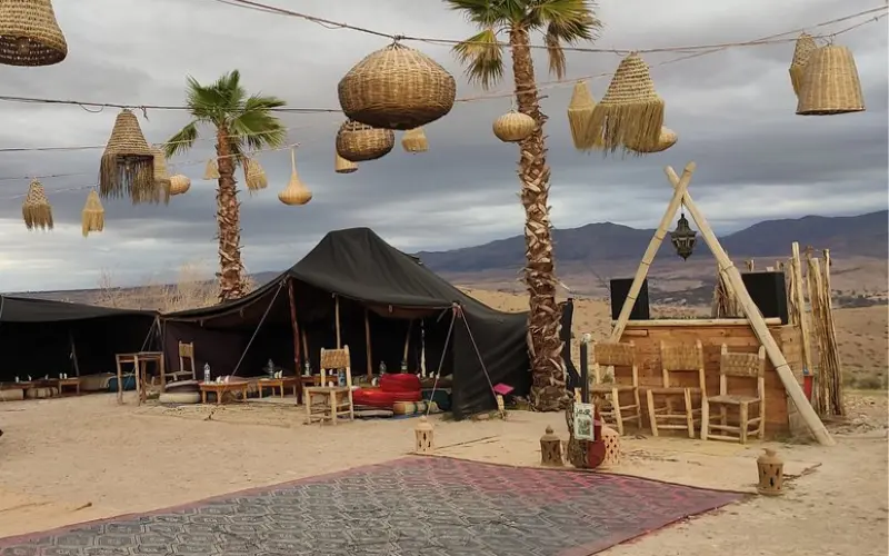 Traditional tents and seating in the Agafay Desert near Marrakech.