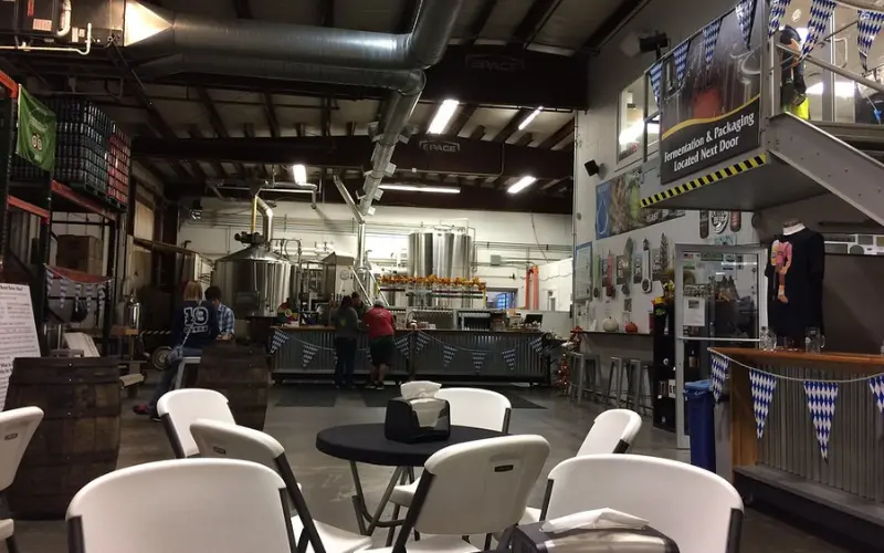Brewery interior with taps and seating at Cape Cod Beer.