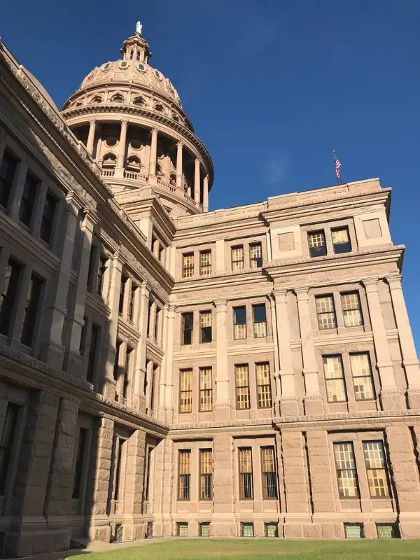 Dome and exterior of the Texas State Capitol building in Austin.