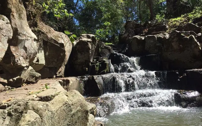 Small waterfall flowing over rocks at Miraflores.