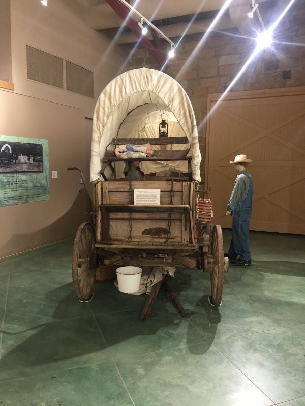 A vintage wooden wagon on display at Batesville's Old Independence Regional Museum