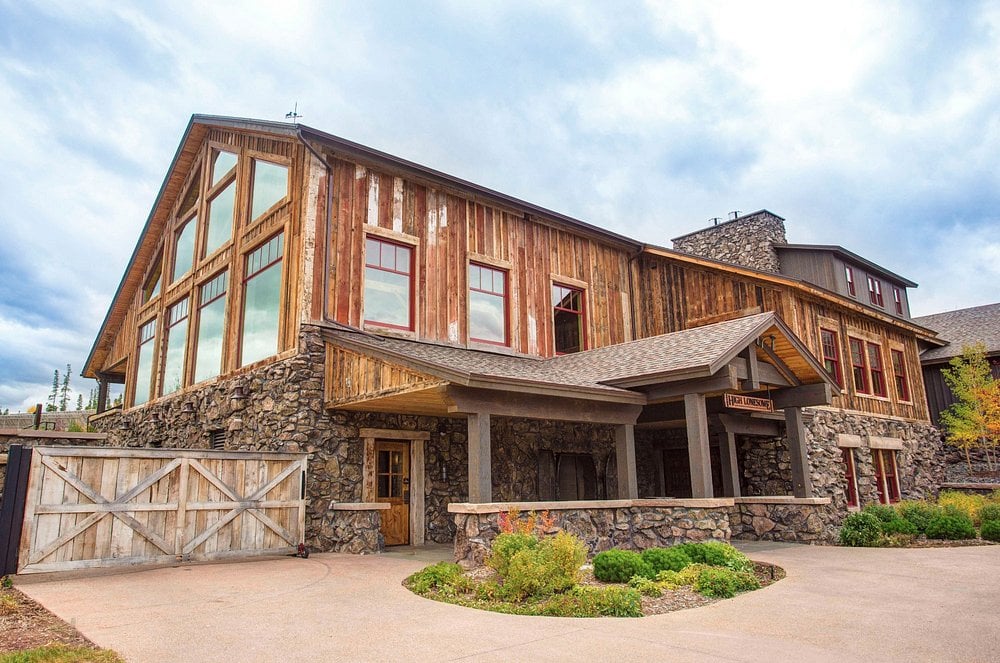 Exterior view of Devil's Thumb Ranch Resort & Spa with rustic stone and wood design.