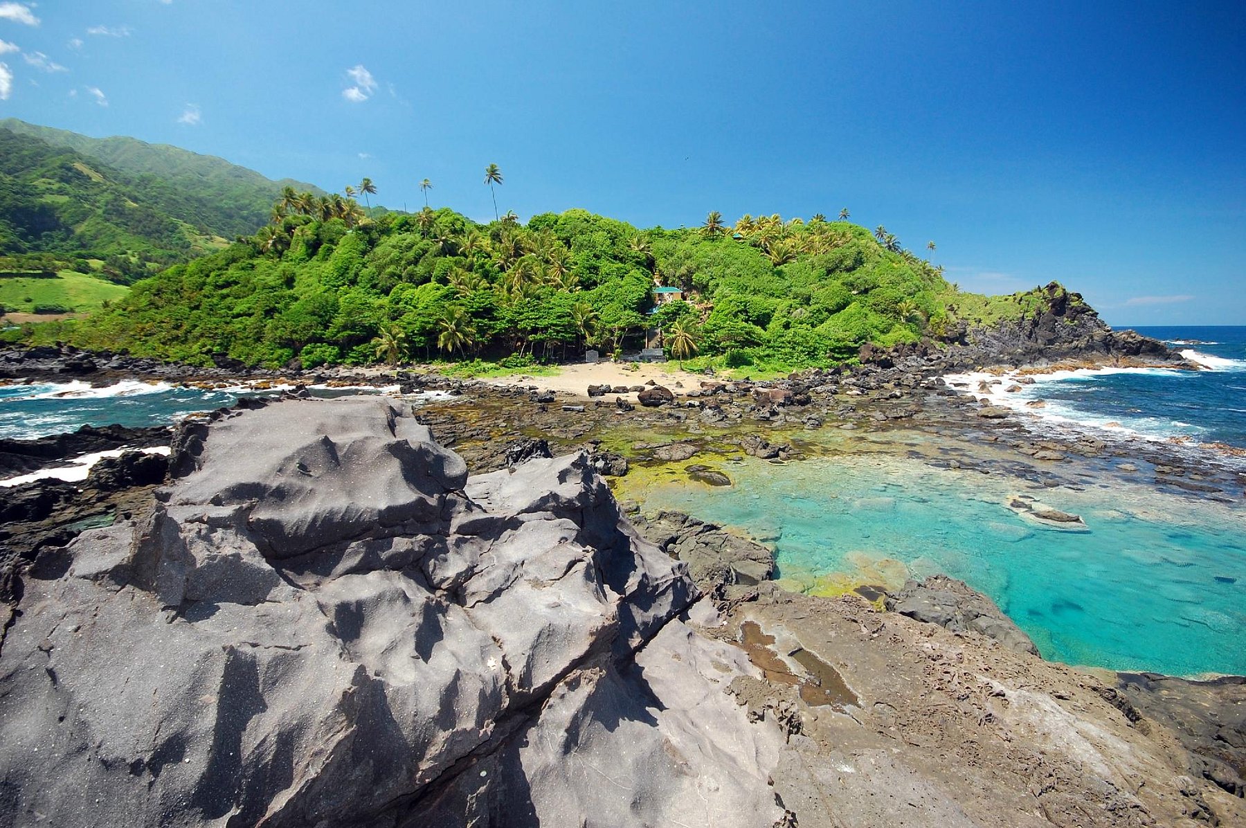 Owia Salt Pond natural swimming pool with volcanic rocks and turquoise water, one of the most beautiful places in St Vincent and the Grenadines.