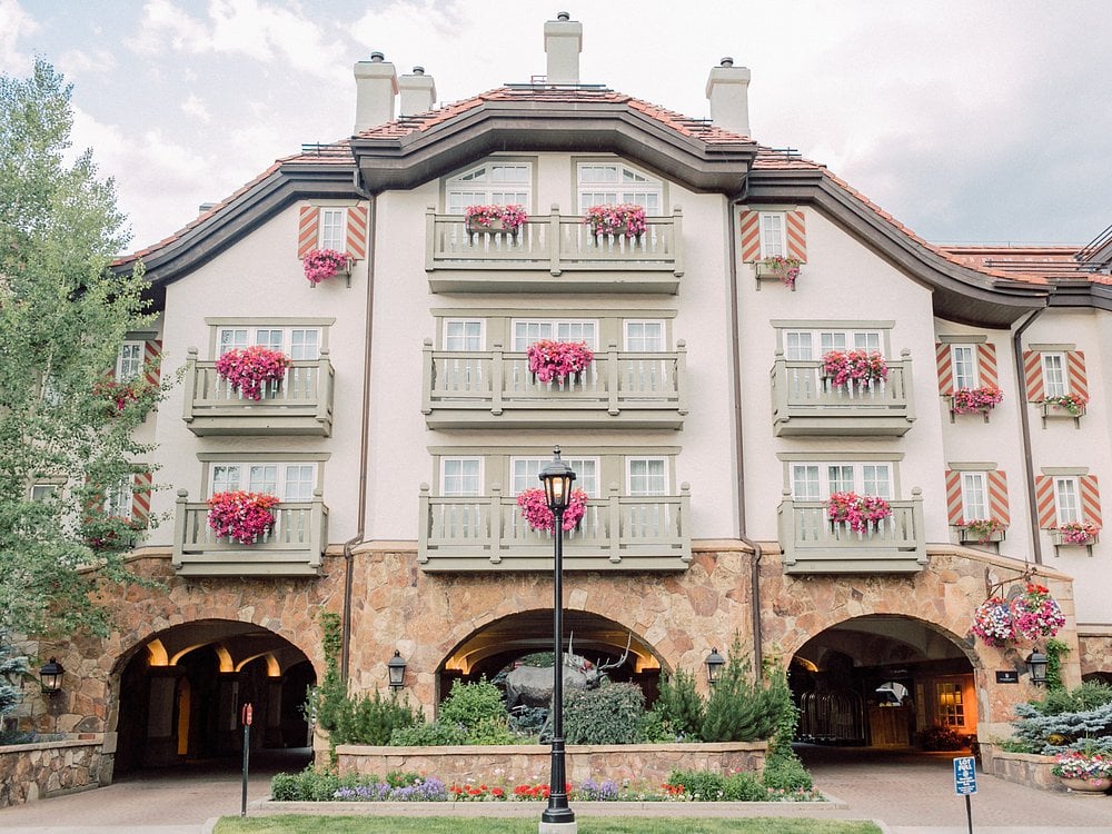 Front view of Sonnenalp Vail with flower-filled balconies and alpine-style architecture.