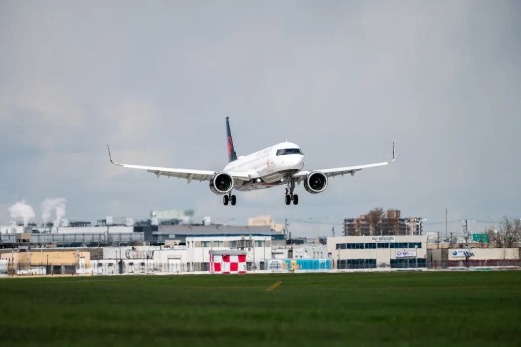 Air Canada Airbus A220-300 passenger aircraft approaching on short final for touchdown landing