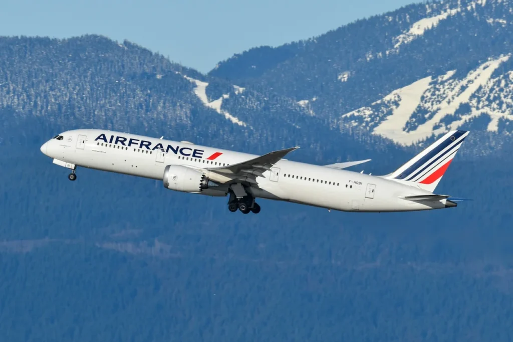 An Air France Boeing 787 Dreamliner commercial passenger airplane flying
