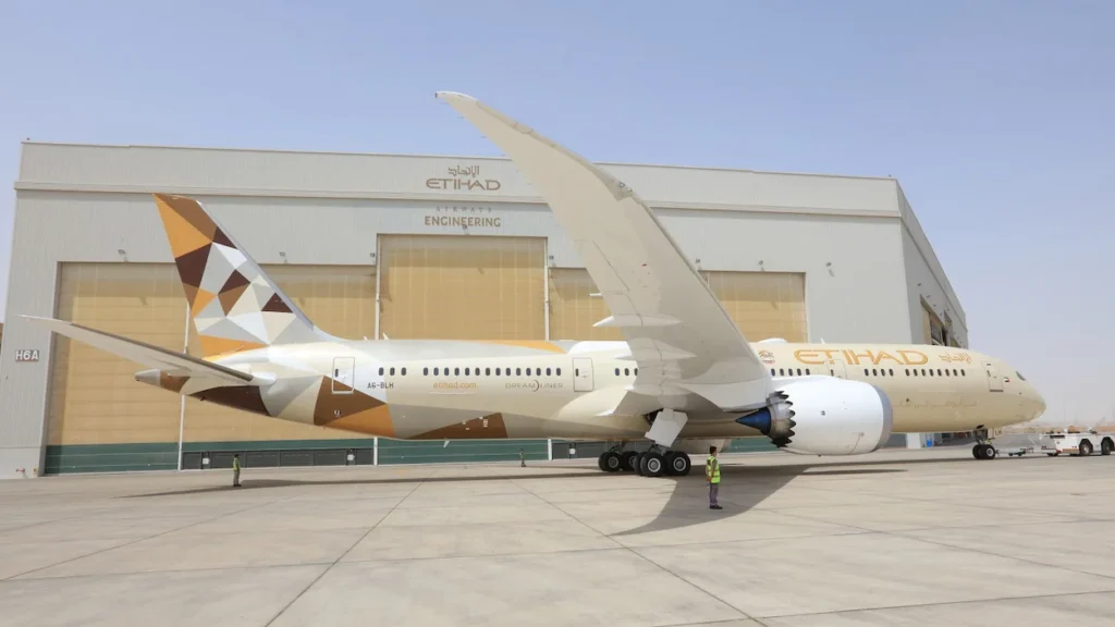 An Etihad Airways Boeing 787 Dreamliner passenger airplane parked on the tarmac