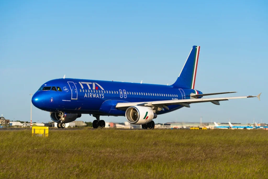 ITA Airways Airbus A320 taxiing on the airport runway