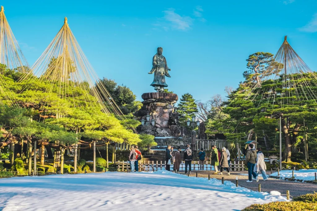 Yamato Takeru statue at the Meiji Monument in a snow-covered Kenrokuen Garden