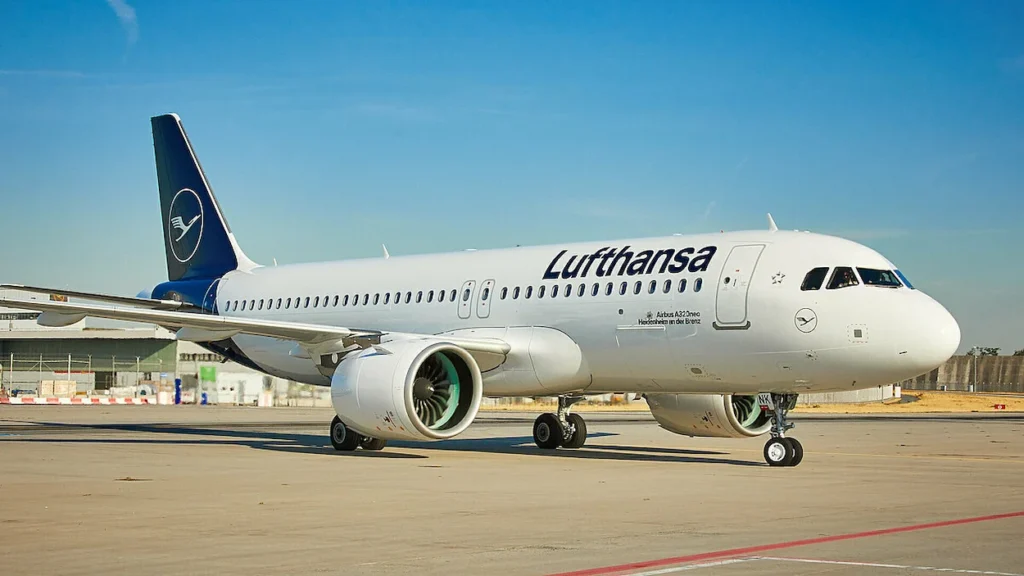 A Lufthansa Airbus A320 commercial airplane stationary on the airport