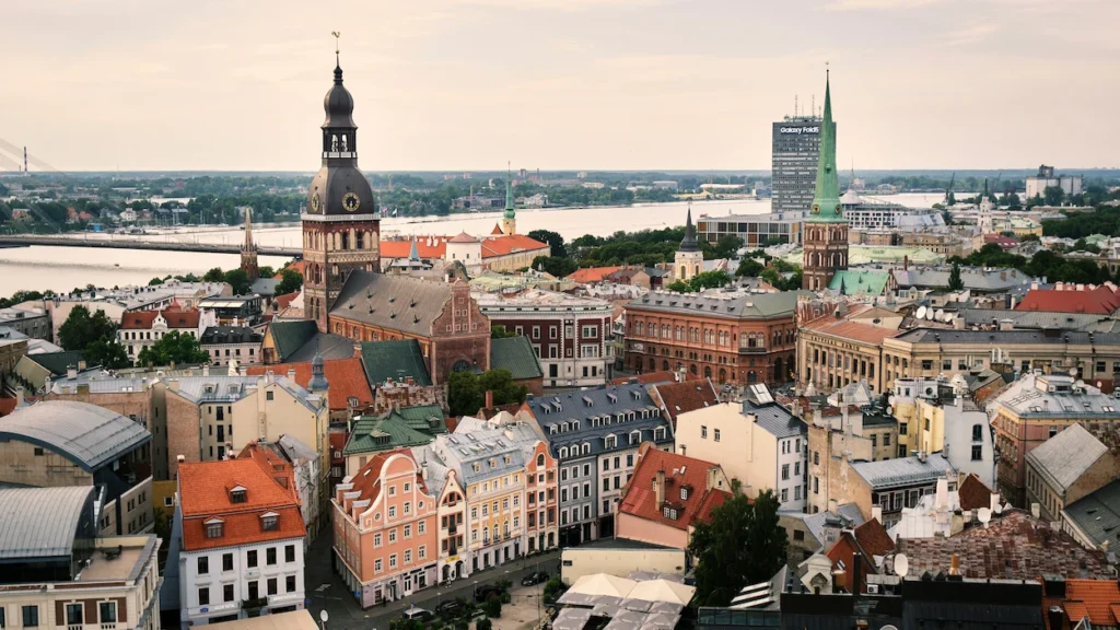 Riga Cathedral tower and colorful old town roofs viewed from above