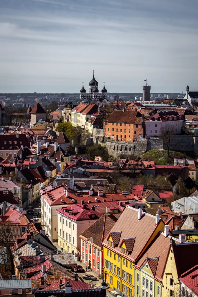 Alexander Nevsky Cathedral and historic colorful building roofs in Tallinn viewed from above