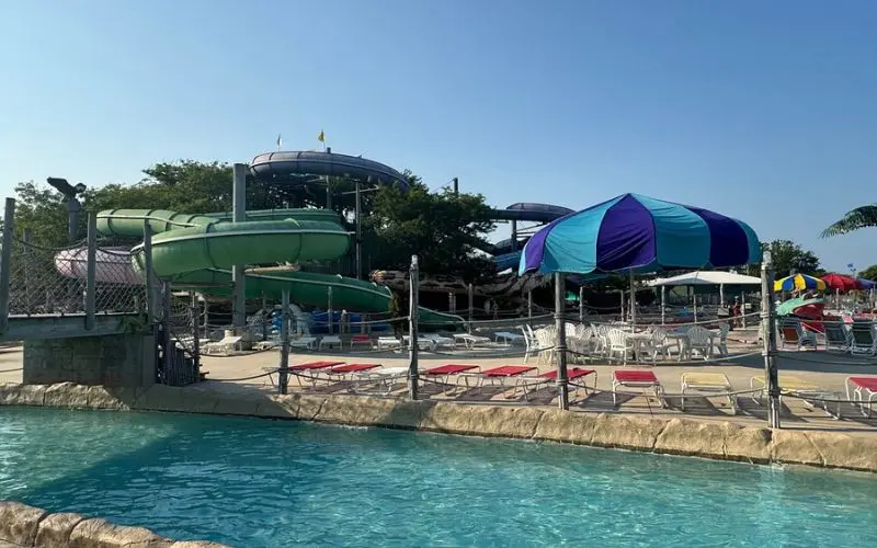 Water slides and pool area with umbrellas at Jungle Jim's.
