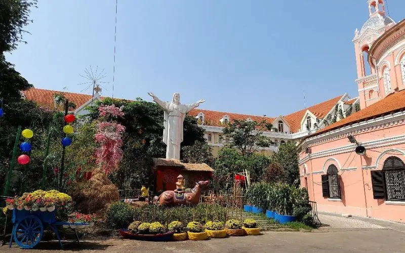 Pink façade and courtyard of Tân Định Church in Ho Chi Minh City.