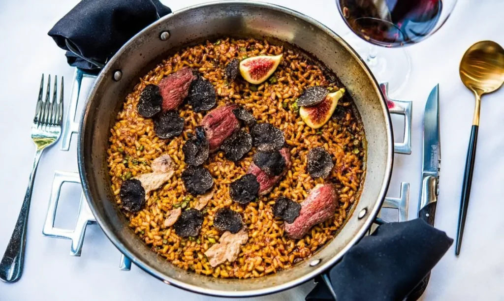 Smoked duck, foie, figs, asparagus, sénia rice, paella method