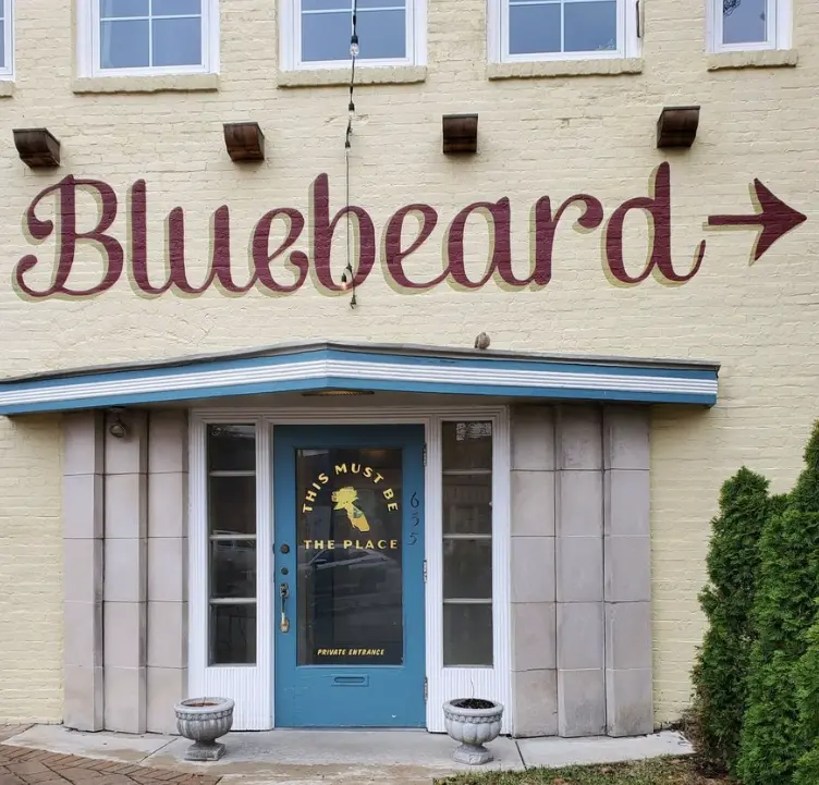 On the patio walking toward entrance