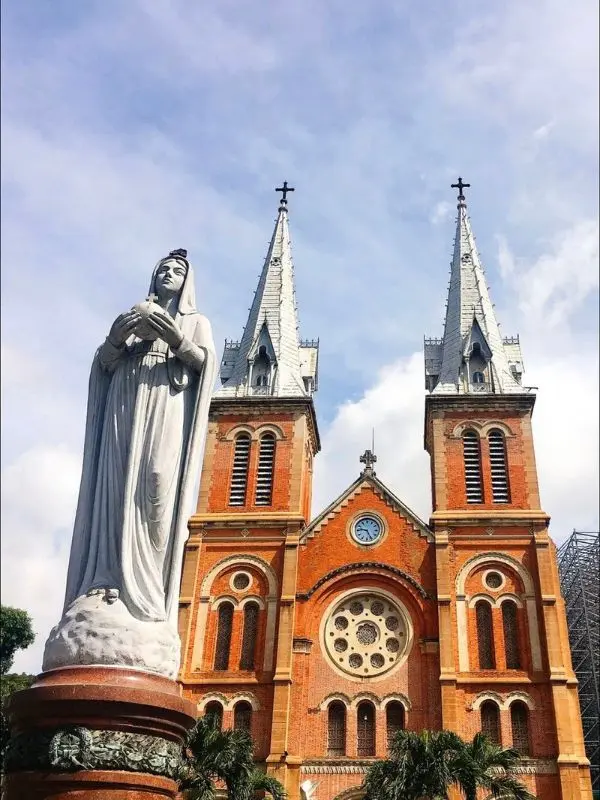 Statue of the Virgin Mary in front of Notre-Dame Cathedral Basilica of Saigon.