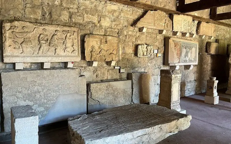 Ancient stone carvings and artifacts inside the Split Archaeological Museum.
