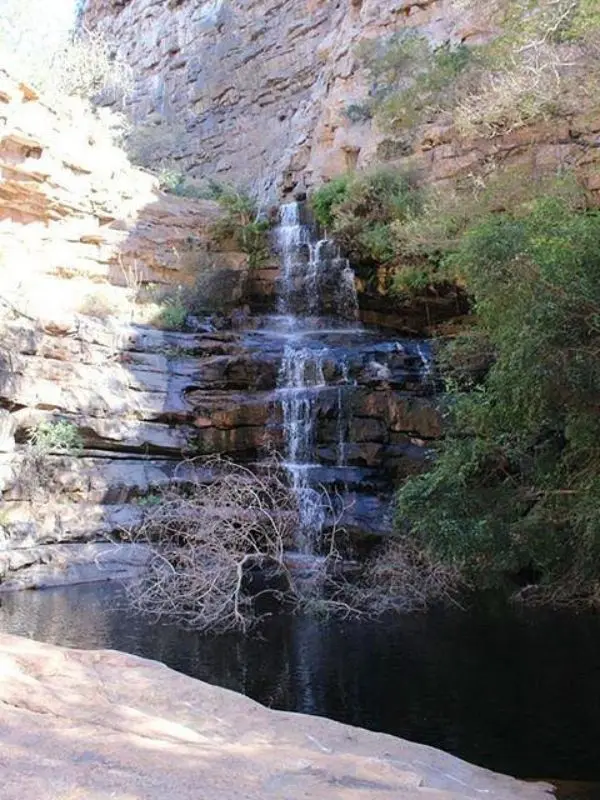 A small waterfall flowing into a pool at Moremi Gorge.