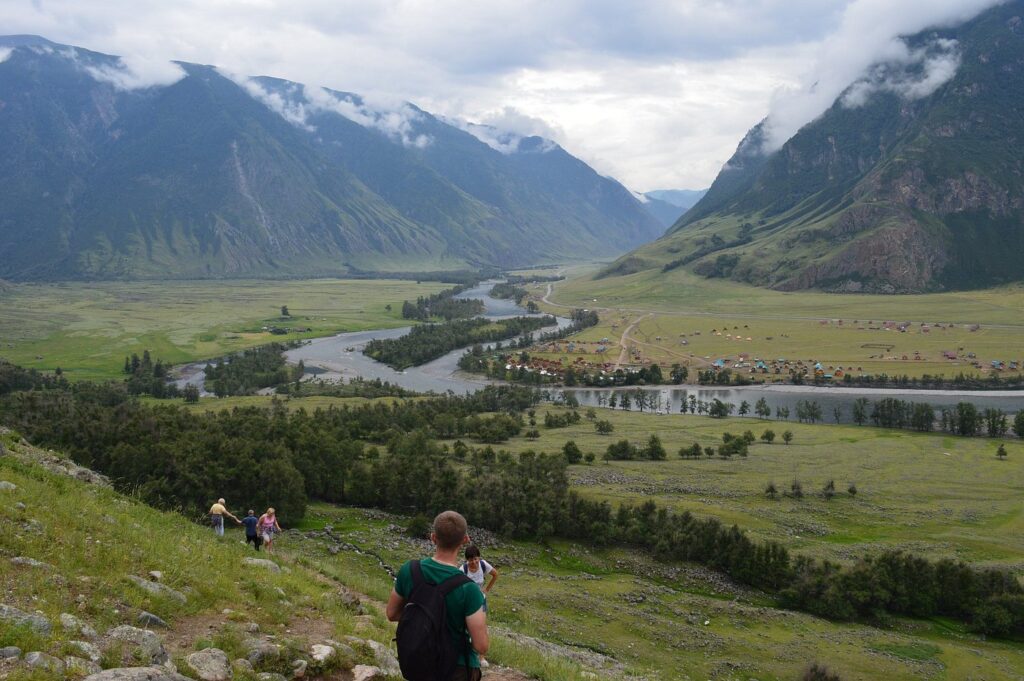 View of the Chulyshman River Valley with mountains and a winding river.