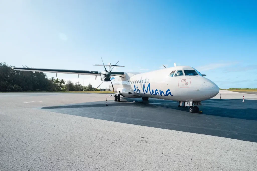 An Air Moana ATR 72 turboprop passenger airplane parked stationary on an airport