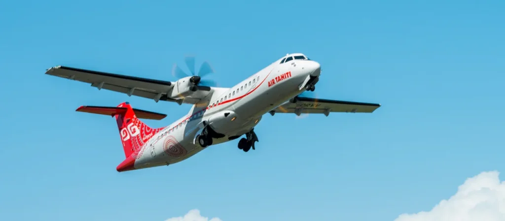 Air Tahiti ATR 72 climbing into a clear blue sky after takeoff