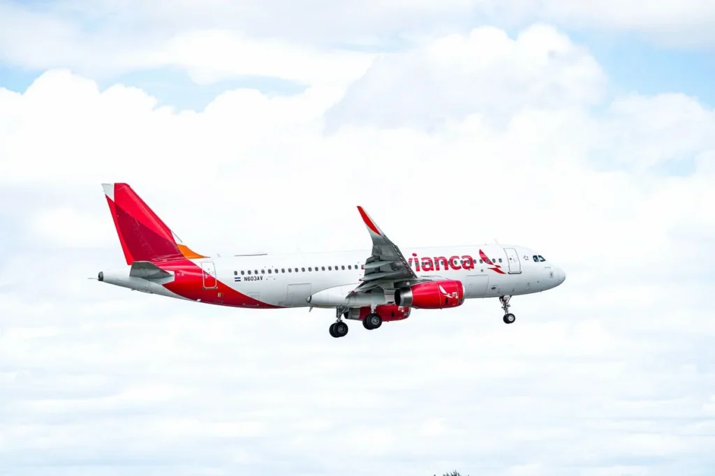 An Avianca Airbus A320 commercial passenger airplane descending on final approach