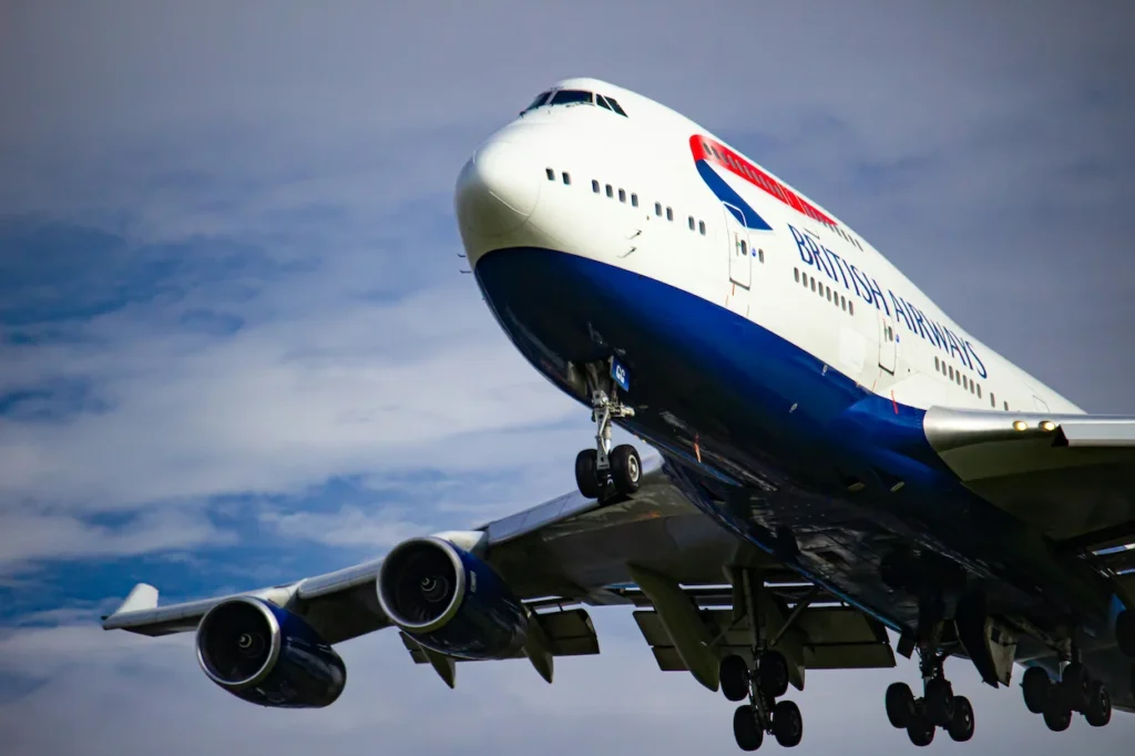 A close-up, low-angle view of a British Airways Boeing 747 airplane