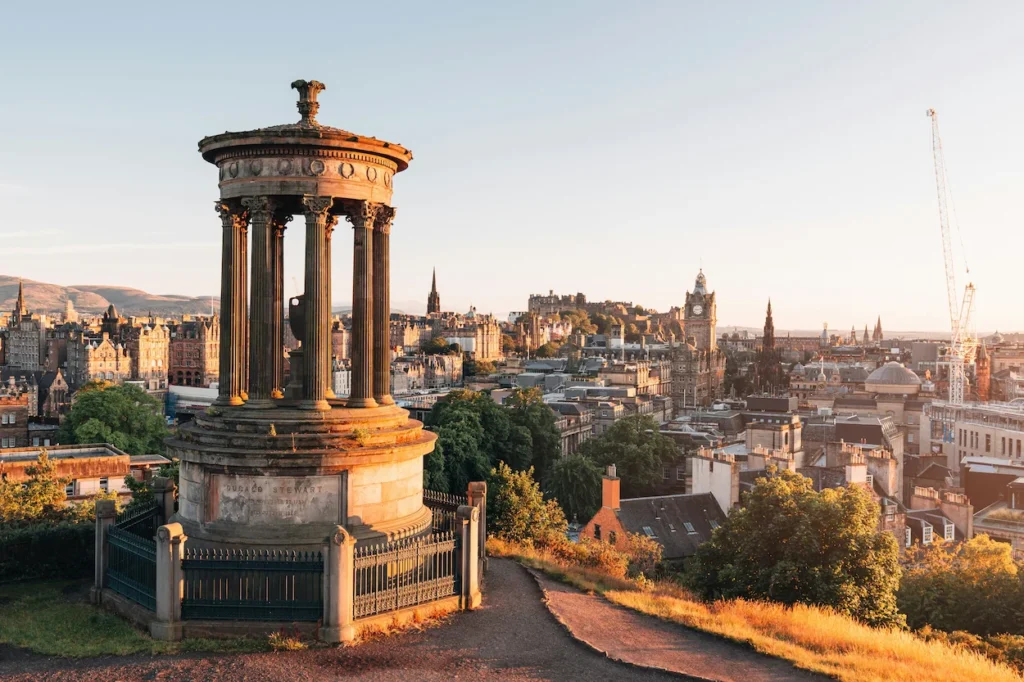 The Dugald Stewart Monument overlooking the Edinburgh city skyline