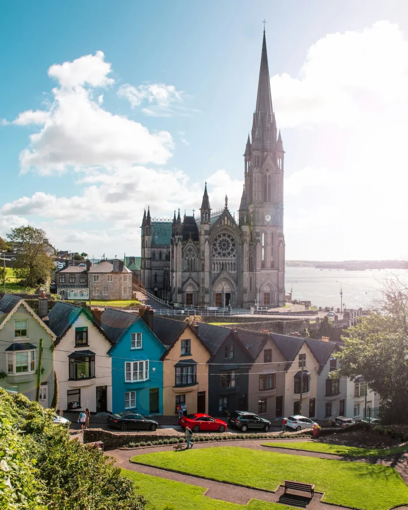 Row of colorful Deck of Cards houses below St Colman's Cathedral in Cobh