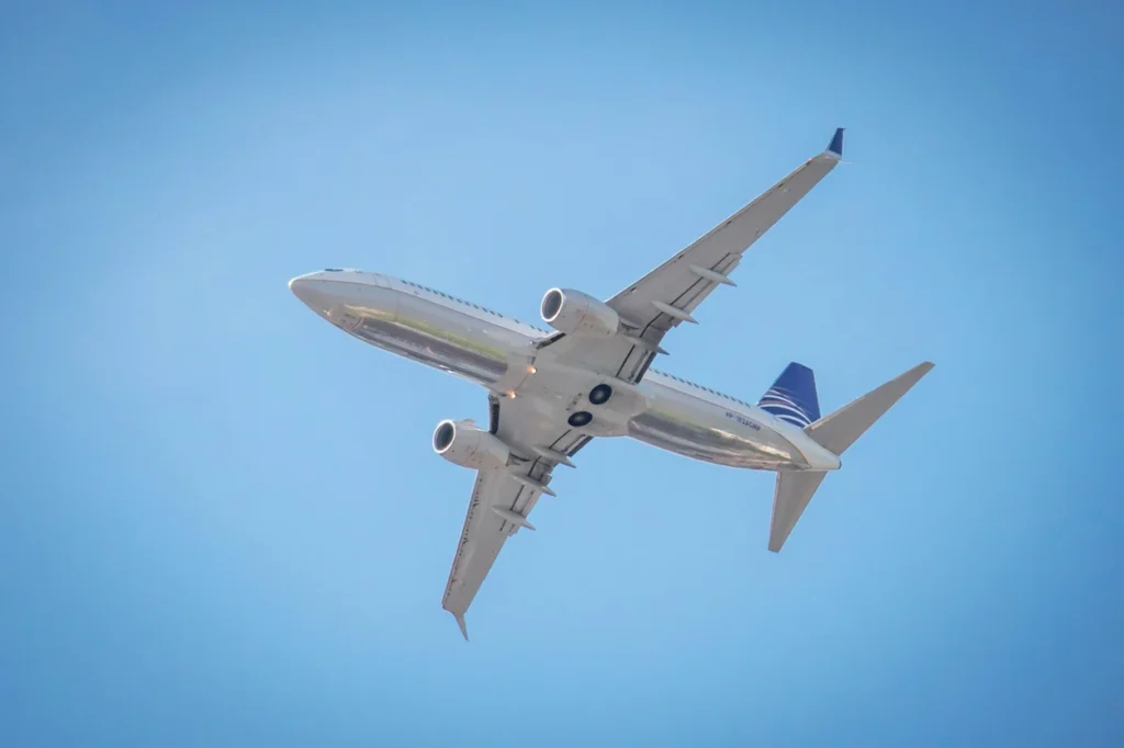 A low-angle view of a Copa Airlines Boeing 737 MAX 9 passenger jet