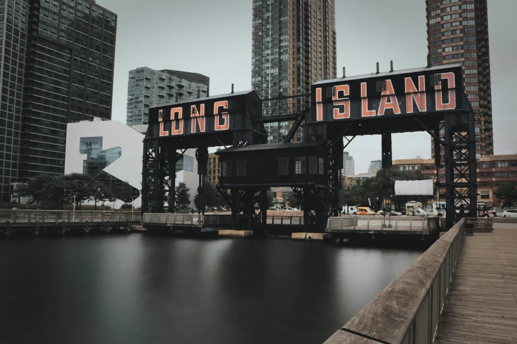 Historic black gantry structure with the "Long Island" sign at Gantry Plaza State Park