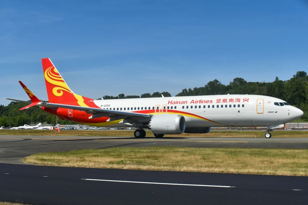 Hainan Airlines Boeing 737 MAX 8 passenger airplane parked stationary on an airport taxiway