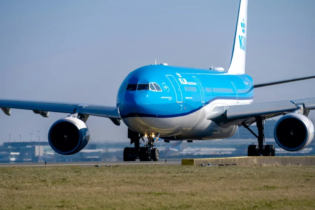 KLM Royal Dutch Airlines Airbus A330-200 passenger airplane taxiing forward on an airport runway