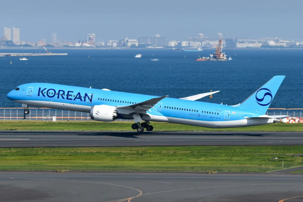 Korean Air Boeing 787 Dreamliner passenger airplane lifting off from a runway