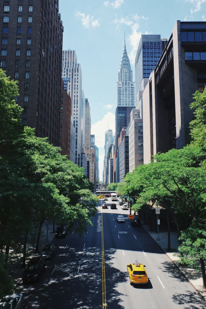 Looking down 42nd Street toward the Chrysler Building with a yellow taxi on the road