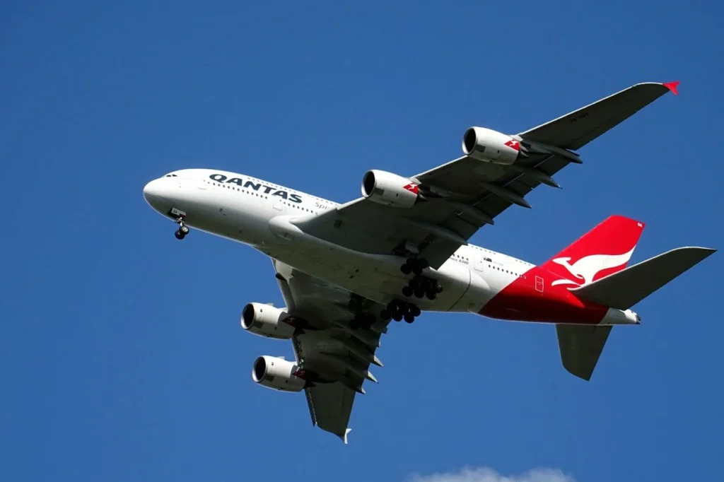 Qantas Airbus A380 double-decker passenger airplane descending on final approach