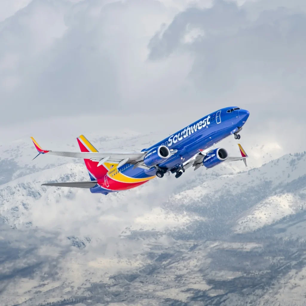 Southwest Airlines Boeing 737 MAX 8 commercial airplane climbing steeply