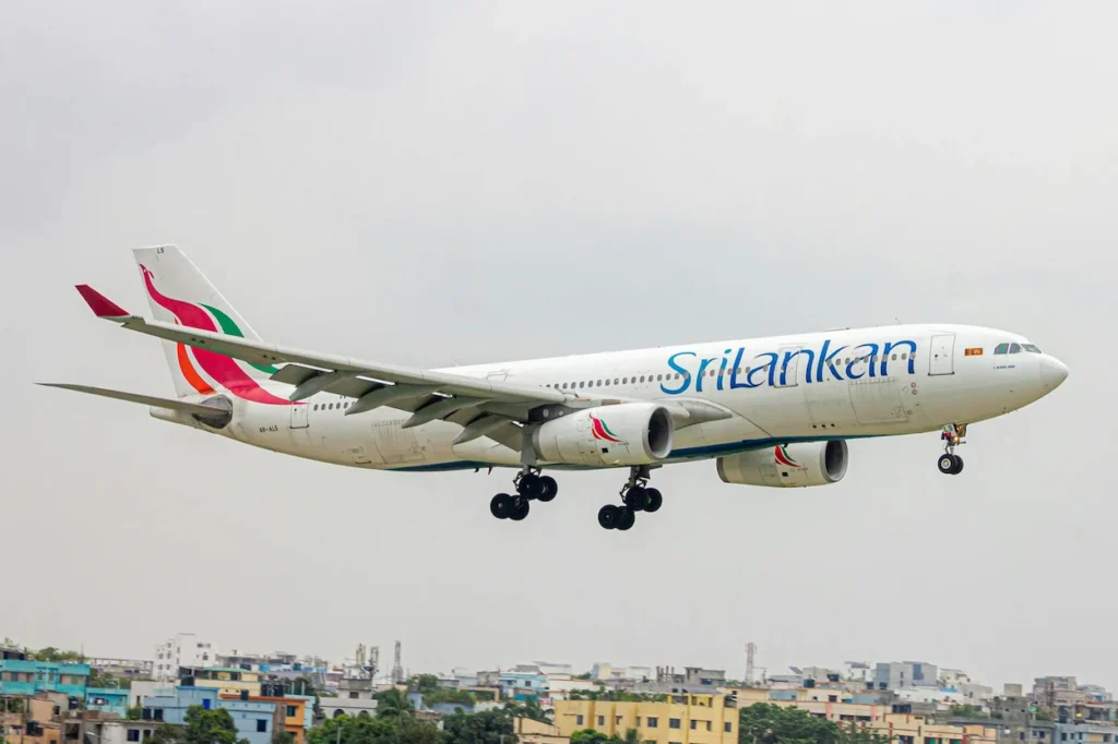 A SriLankan Airlines Airbus A330 twin-engine widebody aircraft preparing to land