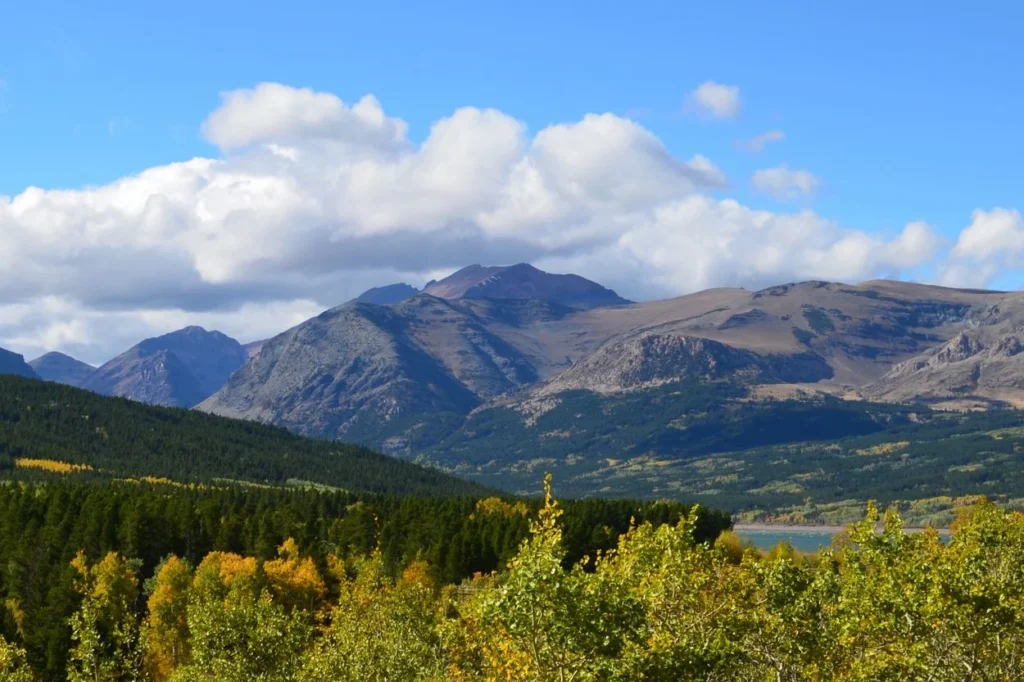 Rolling mountains and autumn foliage near St. Mary Lake in Glacier National Park, Montana