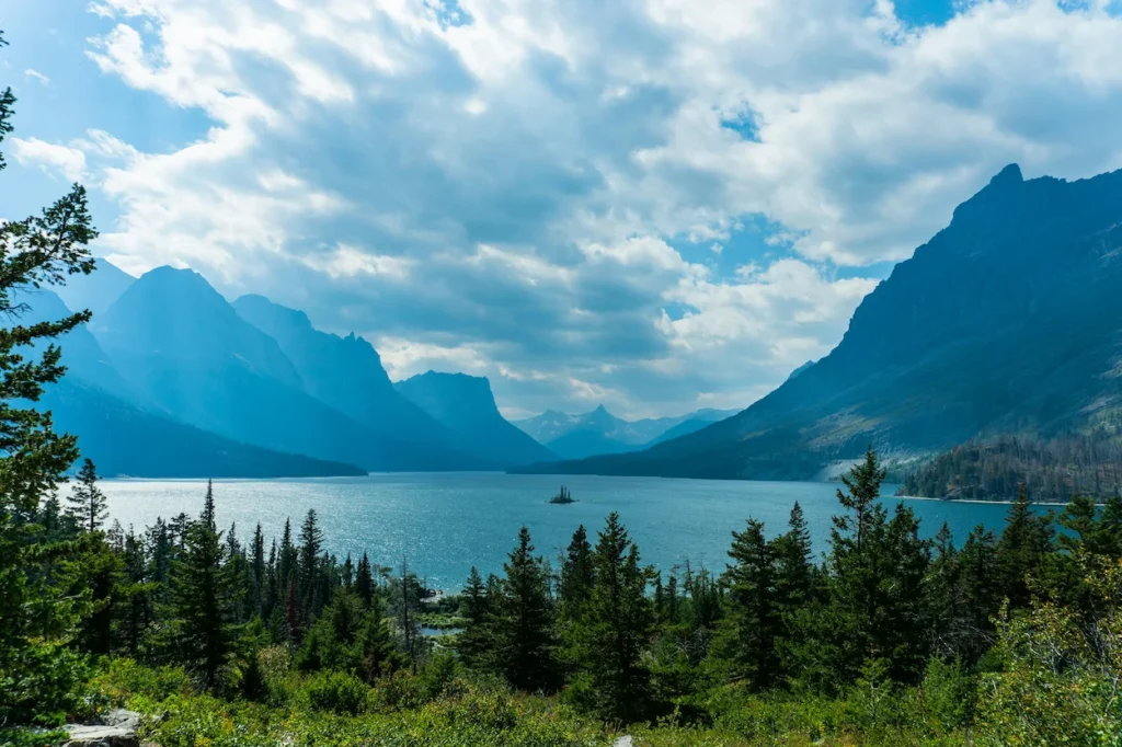 St. Mary Lake and Wild Goose Island surrounded by dramatic mountain peaks in Glacier National Park, Montana