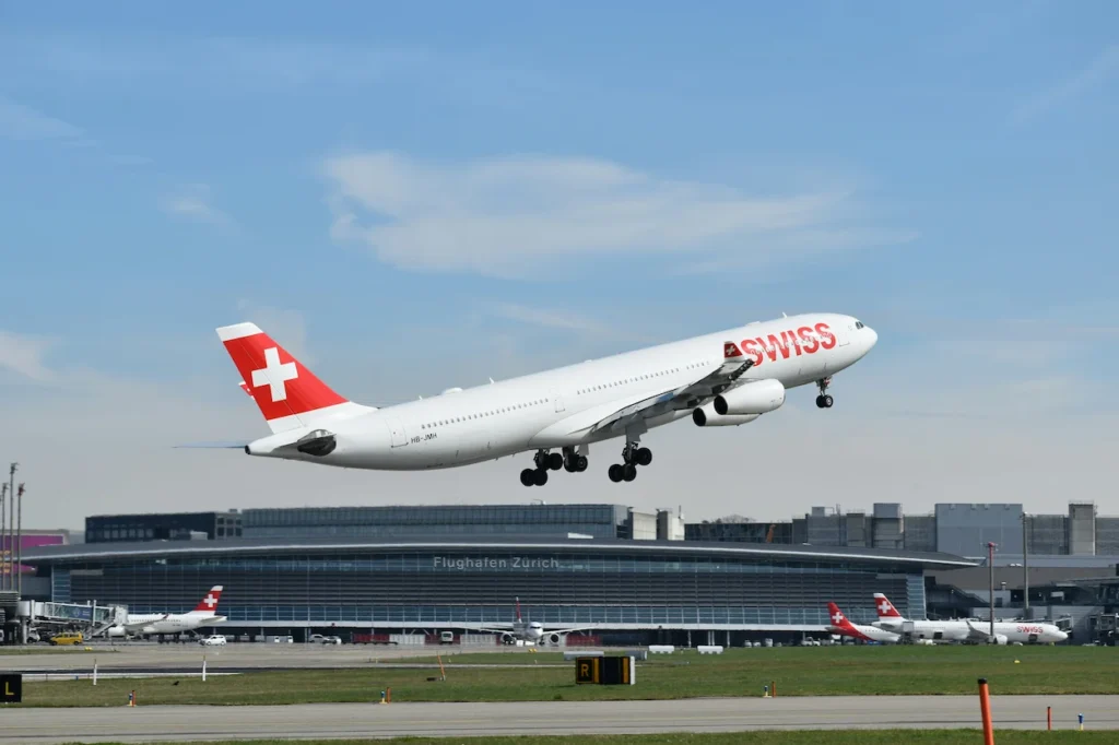 SWISS Airbus A340 taking off over Zurich Airport