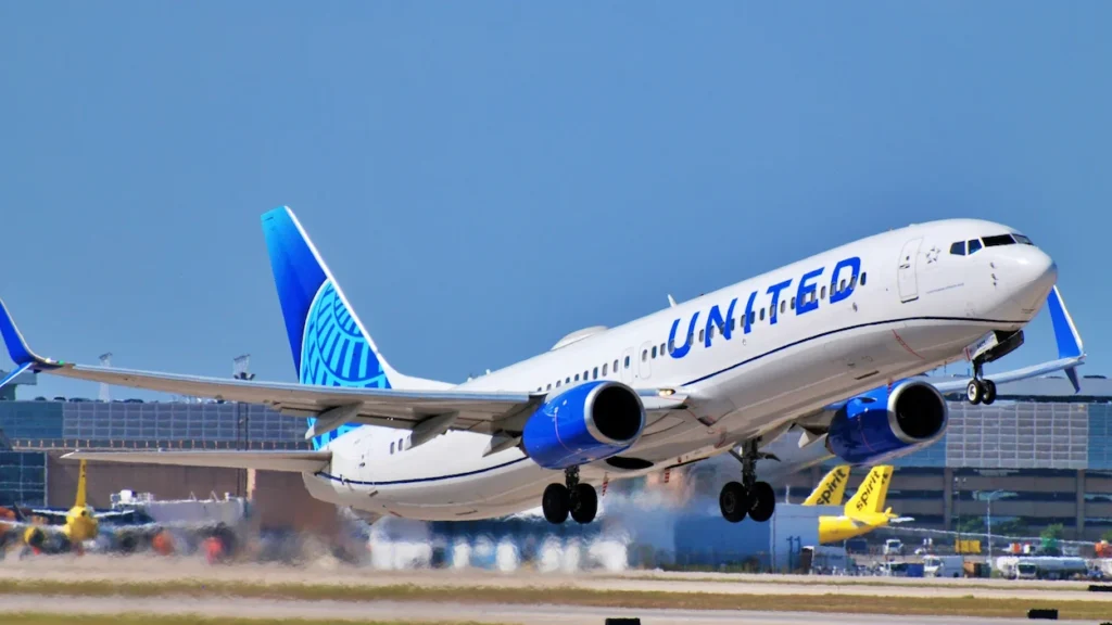 United Airlines Boeing 737 MAX passenger airplane ascending into the sky