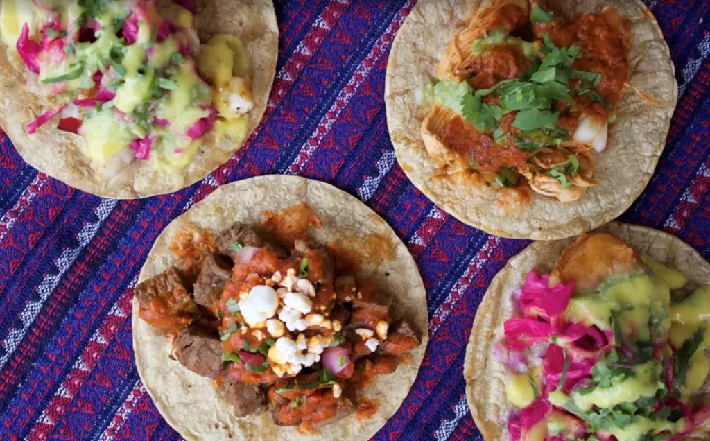 Fish, chicken, and steak tacos