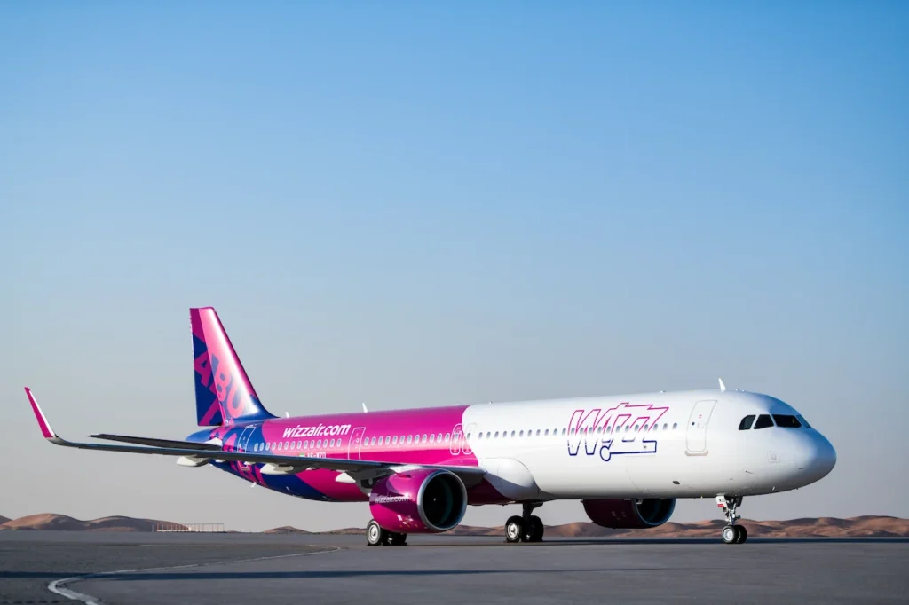 Wizz Air Abu Dhabi Airbus A321neo passenger airplane parked on a tarmac