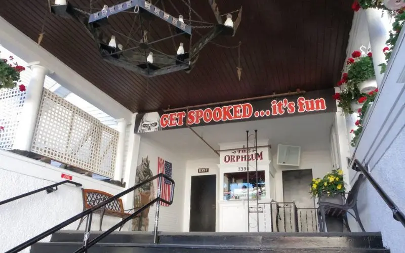 The entrance sign for Mackinac Island’s Haunted Theatre reads “Get Spooked… it’s fun.”