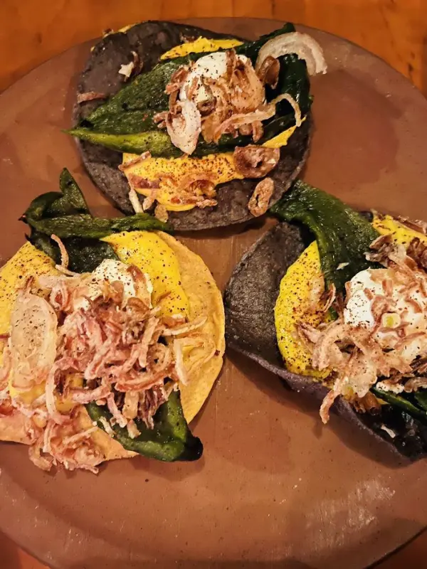 Colorful tacos on a plate at Coba taqueria.